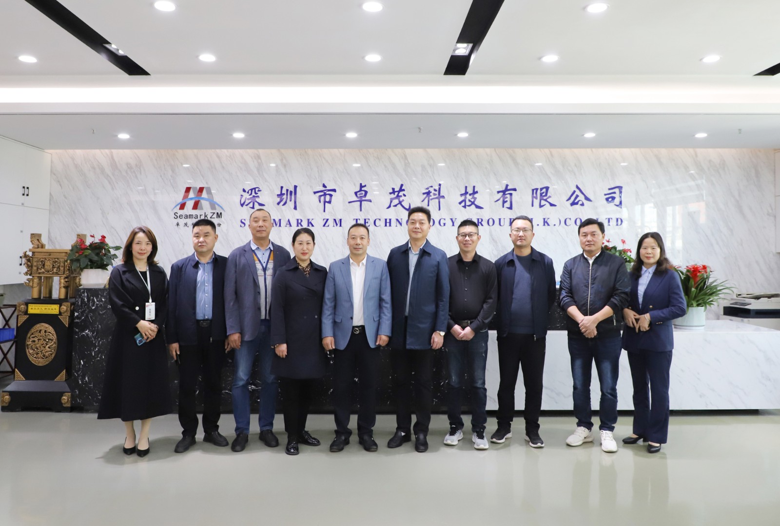 聞總與湖北省?？悼h政府副縣長龔夫一行合影.jpg